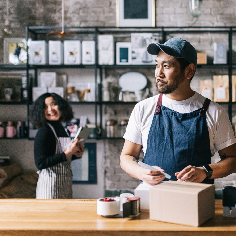 A dynamic scene unfolds in the office as a multiethnic team of business professionals collaborates, reflecting the strength and creativity that comes from diversity.