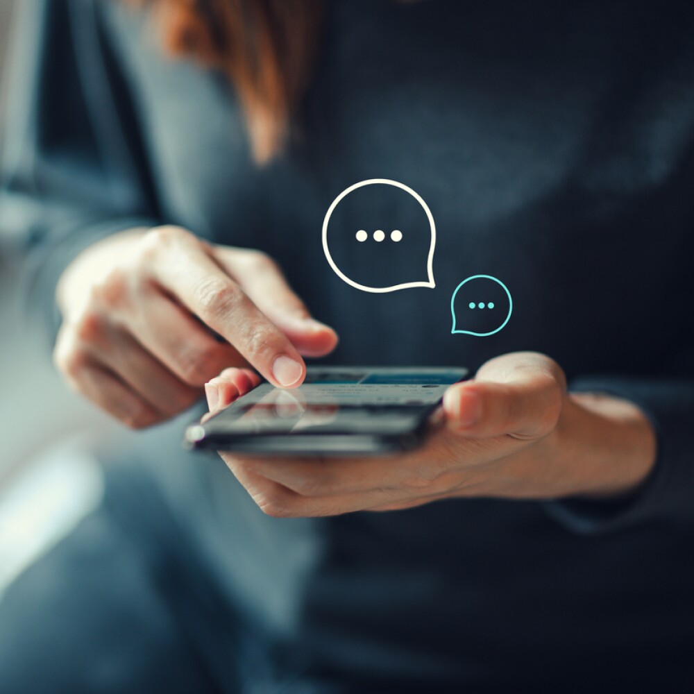 Women's hand typing on mobile smartphone, Live Chat Chatting on application Communication Digital Web and social network Concept. Work from home.